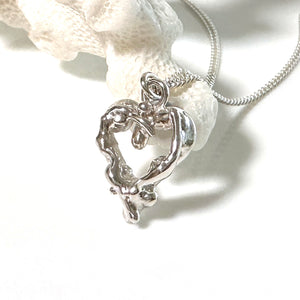 Silver heart shaped necklace inspired by Heart Reef on the Great Barrier Reef