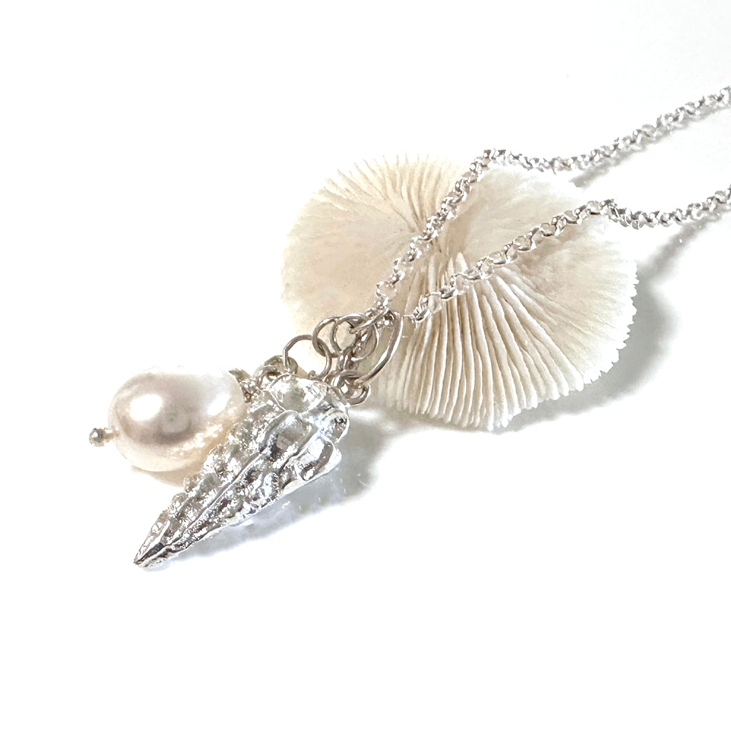 Pure silver sandcast charm necklace with shell with luminous pearl on a sterling silver chain 