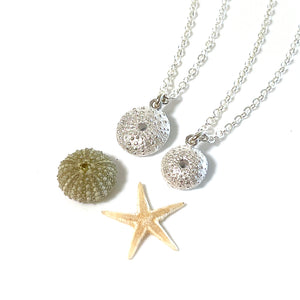 Handcrafted pure silver Sea Urchin Necklace featuring detailed texture moulded from real urchin shell, suspended on sterling silver chain on white background. Ocean-inspired jewellery by Coastalstyle Australia.