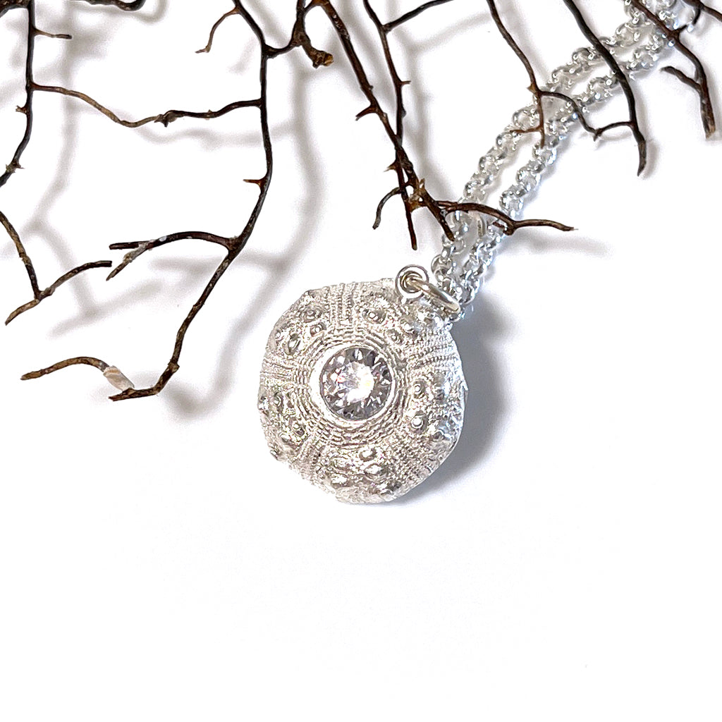 Handcrafted pure silver Knobbly Sea Urchin Necklace featuring authentic textured surface molded from real urchin shell, set with sparkling 6mm Preciosa white diamond. Ocean-inspired jewelry by Coastalstyle Australia