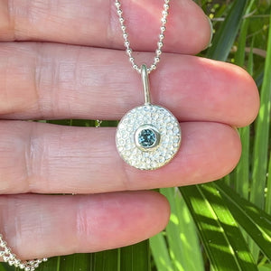 Elegant Ocean Jewel necklace featuring a shimmering blue-green gemstone pendant on sterling silver chain, handcrafted with ethically sourced materials by Coastalstyle Australia