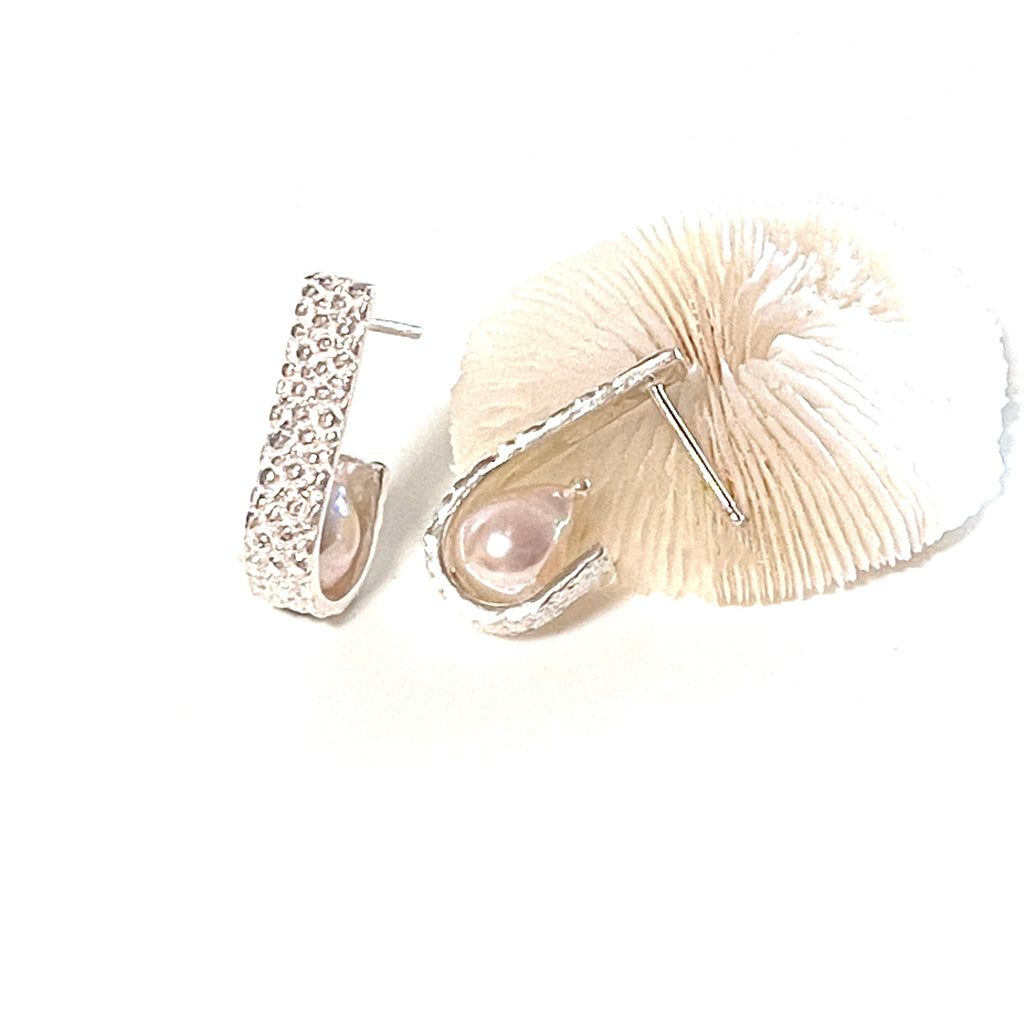 Manta Ray Hoops & Ahoy Pearl Earrings on neutral background