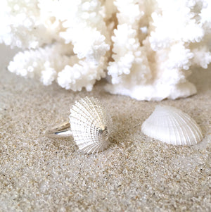 Pure Silver Ocean inspired Treasure Ring on sand