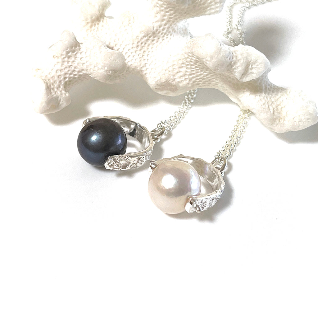 Pearl surrounded by silver with textures from the Great Barrier Reef