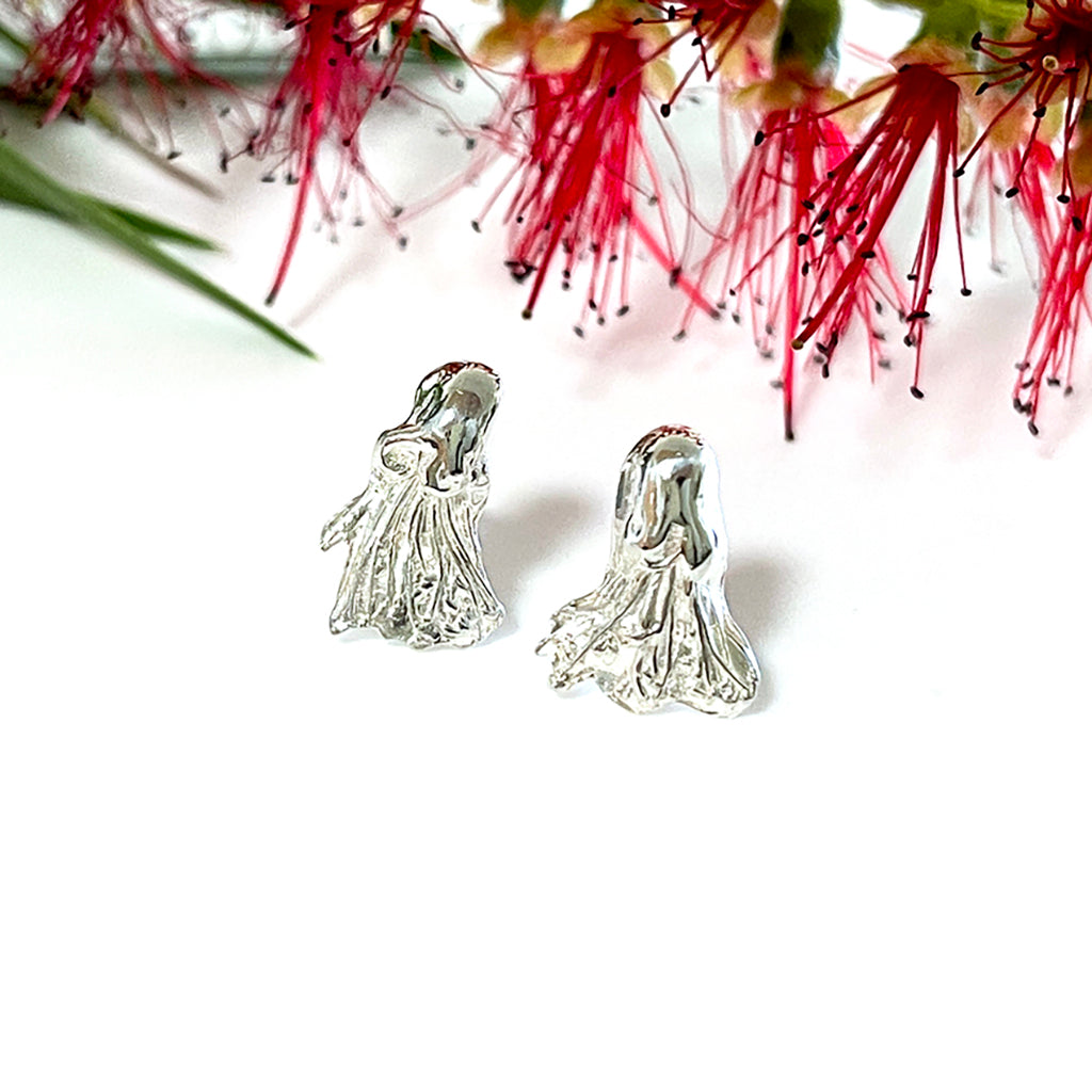 Acacia silver stud earrings with red blossom in background. Coastalstyle Australia