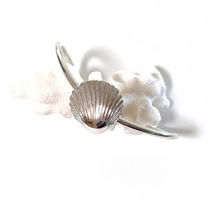 Sun Rays Sea Shell Cuff Bracelet , displayed on natural coral. Coastalstyle Australia.