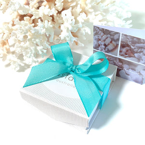 Coastalstyle Australia gift box with turquoise ribbon inspired by the colours of the Great Barrier Reef